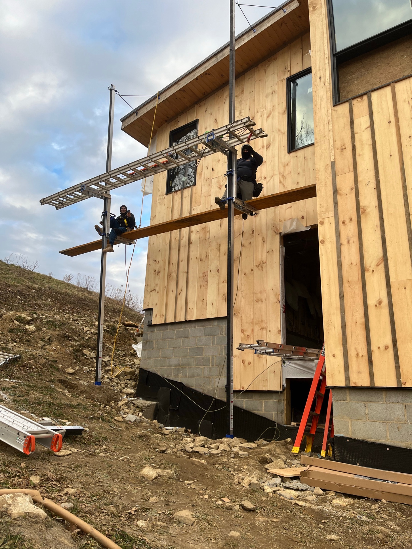 Rep Construction team on scaffolding